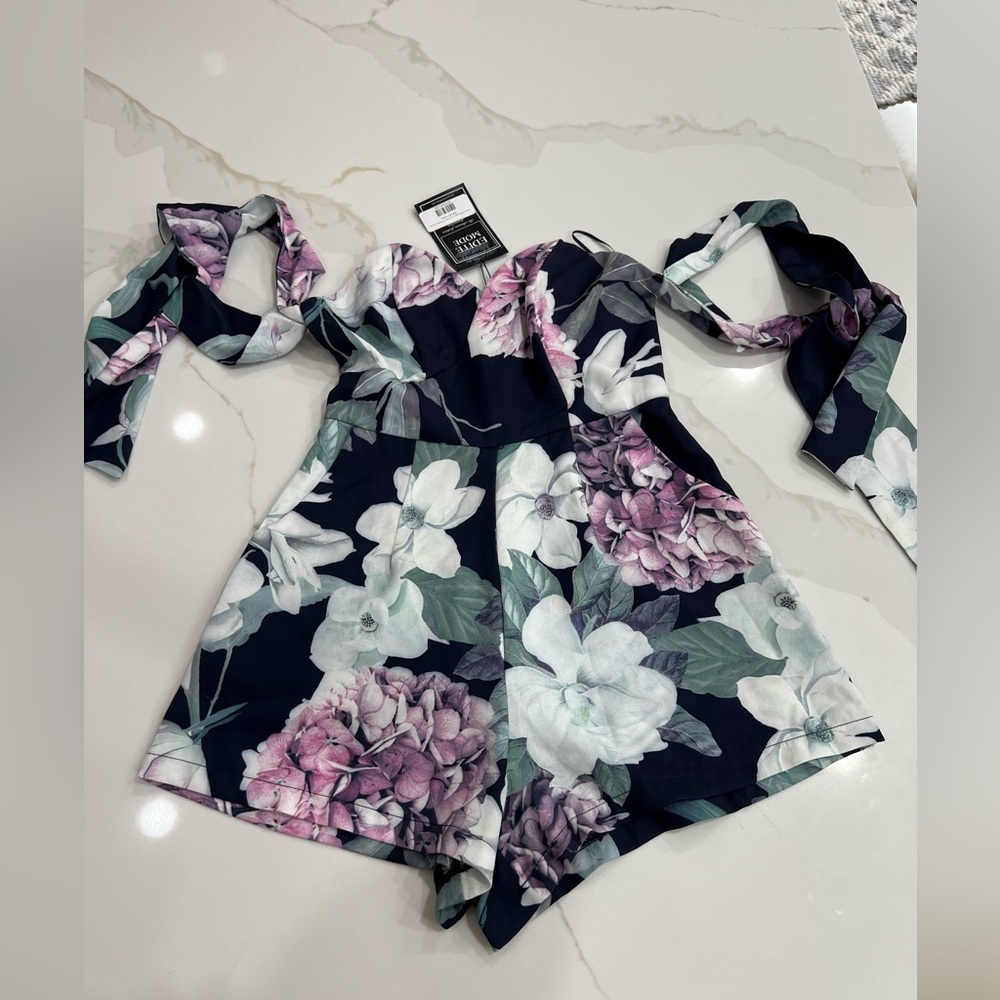 Floral print Blue Romper size small Luxxel off the shoulder